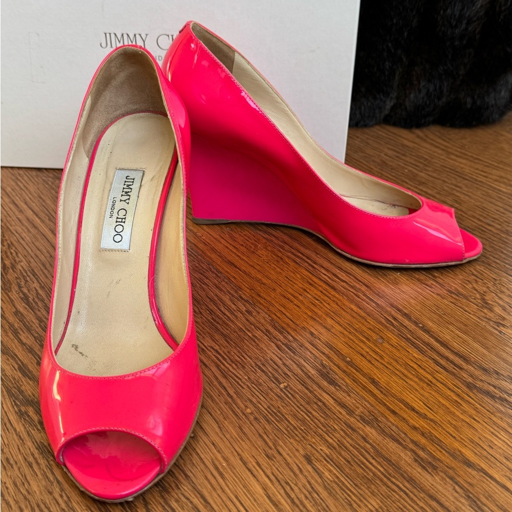 Jimmy Choo Baxen fuchsia patent leather wedges. With original box.
